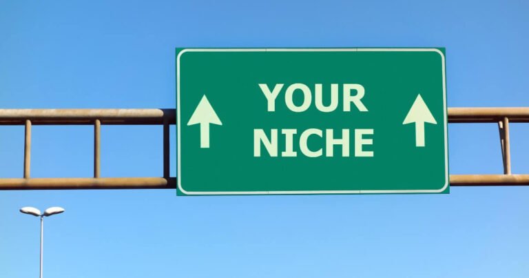 green sign that says your niche above the road