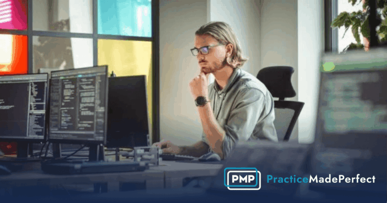 web developer at desk thinking