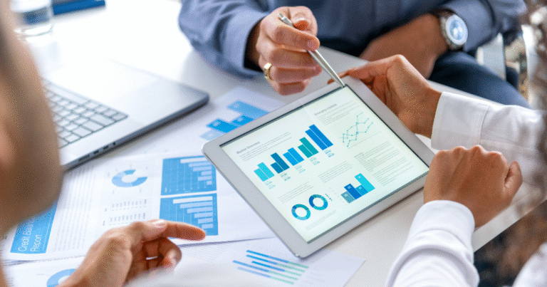 team of people looking at marketing statistics